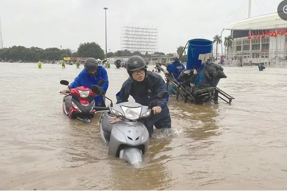 Ngưng chống ngập để chuyển sang sống chung  - 1
